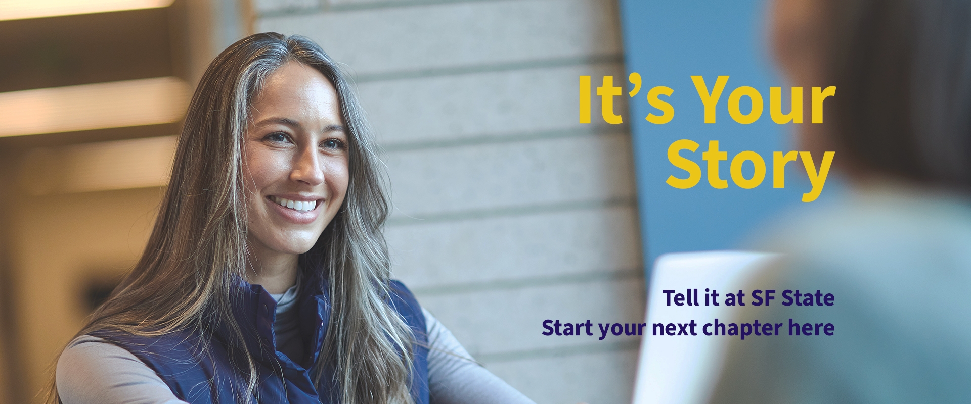 an SF State student smiling with the text "It's Your Story"